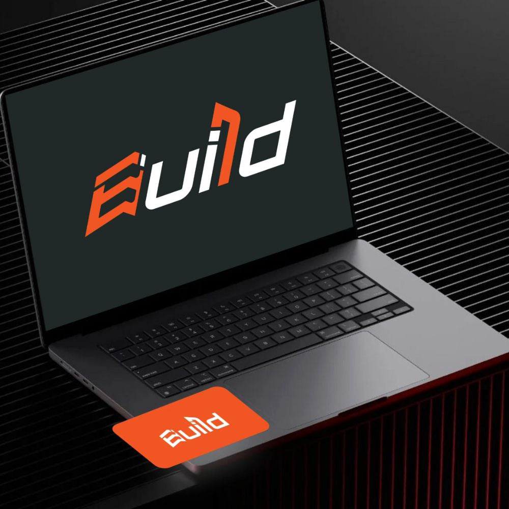 Laptop with 'Build' logo on screen and sticker against a dark background
