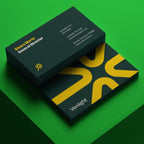 Black business card with yellow text and Venlight logo on a green background