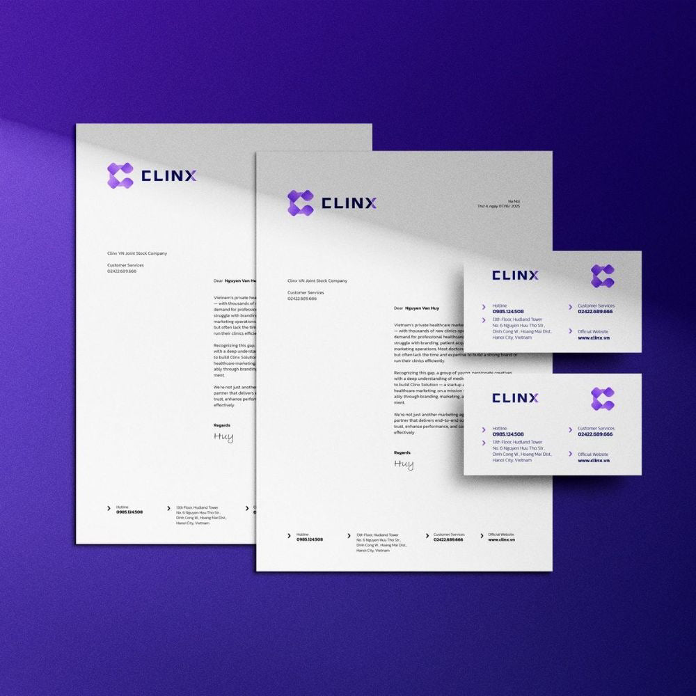 Set of stationery items with CLINX logo on a purple background